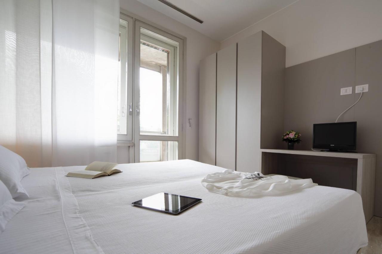 Contempora Apartments - Elvezia 8 - E22 มิลาน ภายนอก รูปภาพ