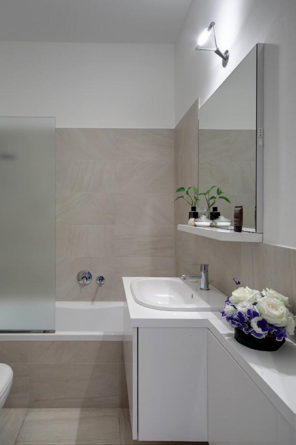 Contempora Apartments - Elvezia 8 - E22 มิลาน ภายนอก รูปภาพ